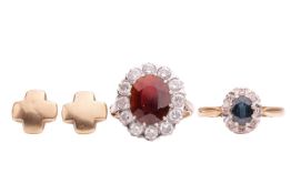 Two gem-set cluster rings and a pair of stud earrings; the first is a sapphire and diamond ring in 1