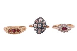 Three gem-set rings; to include a garnet three-stone ring in 9ct gold, size P; a glass-filled ruby a