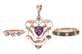An Edwardian pendant and two gem-set rings; the openwork pendant set with a heart-cut amethyst and g