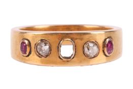 A ruby and diamond-set ring, featuring two oval rubies and two old-cut diamonds, with the central st
