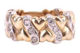 A dress ring tested as 14ct gold, of heart design, featuring mirrored hearts interspaced with paste-