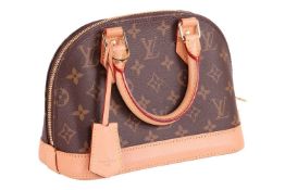 Louis Vuitton - an Alma BB bag in monogram coated canvas and tanned leather, top zipper closure with