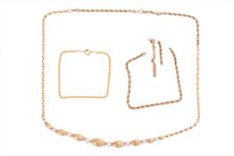 A gold necklace and yellow metal and gold chains; A gold and cultured pearl necklace, featuring grad