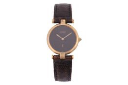 A Must de Cartier ladies quartz wristwatch, with a black enamel face in a gilt case, marked '925', t
