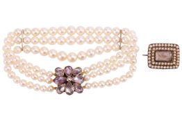 A three-row graduated pearl bracelet and a George III mourning fichu pin; the bracelet comprising th