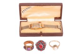 Three gem set rings and an Eterna ladies wristwatch; A cultured pearl and 9ct gold ring, the pearl c