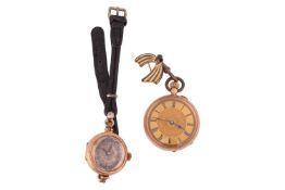 An open-faced pocket watch, marked '14K', having foliate and scrolling engraved detailing to the ext