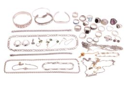A group of silver and white metal items including a Pandora overlapping multi-row ring, three bangle