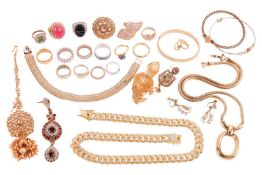 A collection of gold-plated jewellery including a CZ-set curb link necklace, an enamel torc bangle, 