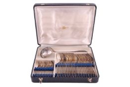 A French Metal Alliage Blanc part canteen with acanthus scrollwork finials, comprising twelve tables