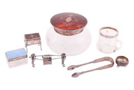 A collection of silver items; to include a large round pressed glass jar, silver mounted tortoiseshe