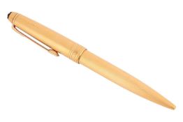 A Mont Blanc Meisterstruck ballpoint pen, the gold-plated body of engine-turned design, without ink 