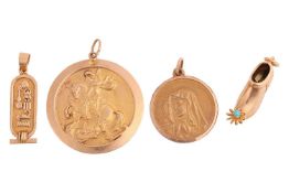 A collection of jewellery items comprising a Madonna medallion and a large medallion depicting St Ge