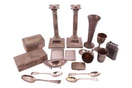 A group of Silver and white metal items; Two square based silver candlesticks of fluted column desig