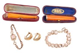 A pair of fluted half hoop earrings, with hinged post backs, stamped '750'; a cultured pearl bracele