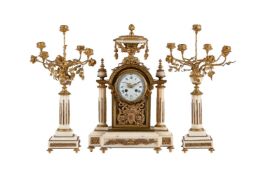 A FRENCH LOUIS XVI STYLE ORMOLU AND WHITE MARBLE MANTEL CLOCK GARNITURE