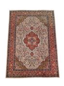 A PERSIAN TABRIZ CARPET