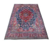 A KIRMAN CARPET