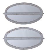 A PAIR OF PAINTED PINE OVAL WALL MIRRORS