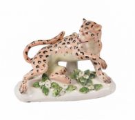 A DERBY PORCELAIN MODEL OF A CHEETAH