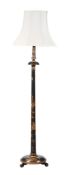 A BLACK LACQUERED STANDARD LAMP