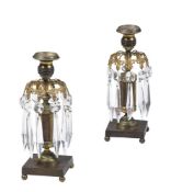 A PAIR OF GILT BRONZE TABLE LUSTRE CANDLESTICKS
