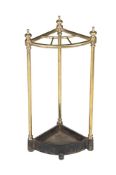 A VICTORIAN BRASS AND CAST IRON CORNER STICK STAND