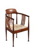 AN ART NOUVEAU MAHOGANY AND INLAID TUB-ARMCHAIR