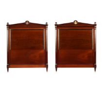 TWO FRENCH 'PLUM PUDDING' MAHOGANY, EBONY, BRASS MOUNTED AND INLAID HEADBOARDS