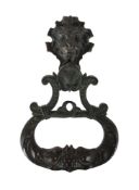 A CONTINENTAL BRONZE DOOR KNOCKER