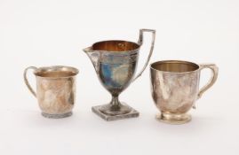 A GEORGE III SILVER CREAM JUG