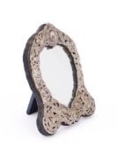 A VICTORIAN SILVER MOUNTED MIRROR