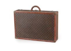 LOUIS VUITTON, A MONOGRAMMED COATED CANVAS HARD SUITCASE
