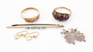 A MID VICTORIAN GARNET AND SEED PEARL DRESS RING
