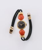 Y UNIVERSAL GENEVE FOR ASPREY, A LADY'S 18 CARAT GOLD AND CORAL WRIST WATCH