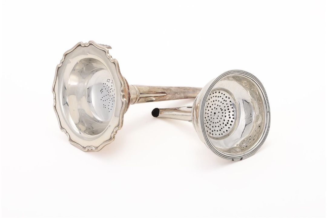 A GEORGE III SILVER WINE FUNNEL
