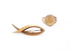 A SEED PEARL AND DIAMOND CLUSTER PANEL RING