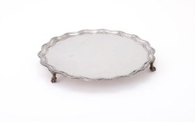 A LATE VICTORIAN SILVER SHAPED CIRCULAR SALVER