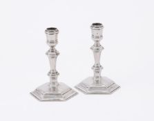 A PAIR OF VICTORIAN SILVER TAPER STICKS