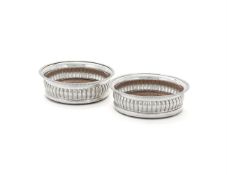 A PAIR OF GEORGE IV SILVER COASTERS