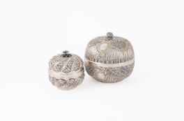 A SILVER COLOURED BOWL AND COVER