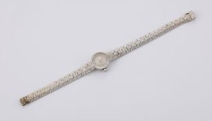 BEUCHE GIROD, A LADY'S 9 CARAT WHITE GOLD BRACELET WATCH