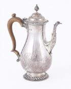 A SILVER BALUSTER BACHELOR'S COFFEE POT