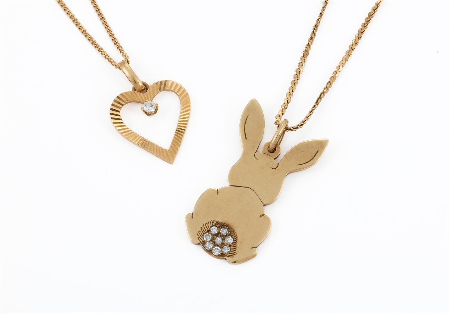 A 9 CARAT GOLD AND DIAMOND RABBIT PENDANT, LONDON 1976