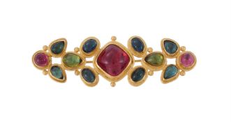 A TOURMALINE AND PERIDOT BROOCH