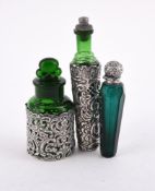 THREE SILVER MOUNTED SCENT BOTTLES