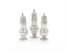 A PAIR OF GEORGE II SILVER PEPPERETTES