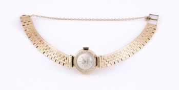 GENOR, A LADY'S GOLD BRACELET WATCH