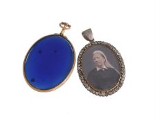 A GEORGIAN GLAZED LOCKET AND A VICTORIAN PASTE LOCKET