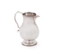 A GEORGE II SILVER BALUSTER SPARROW BEAK CREAM JUG